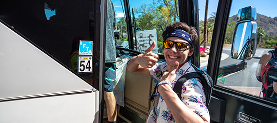 a guy boarding a bus