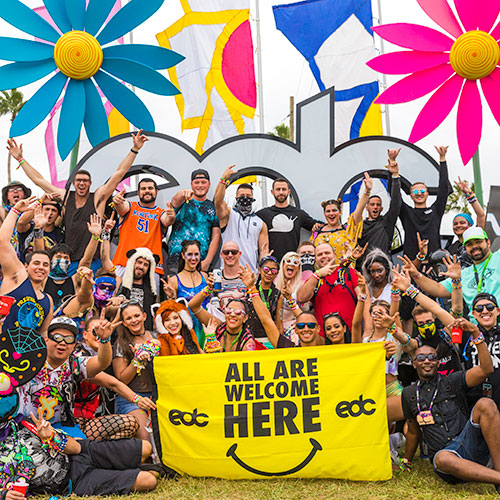 Headliners with 'All Are Welcome Here' banner