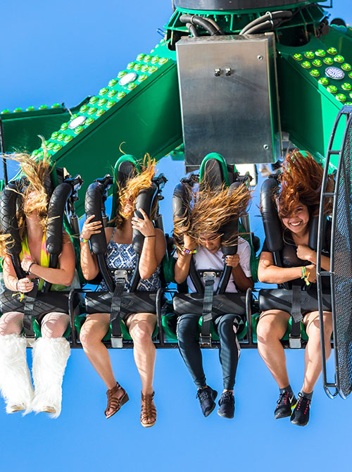 Headliners enjoy a carnival ride at EDC Orlando