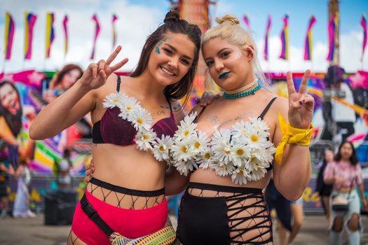 Two girls wearing daisy bras
