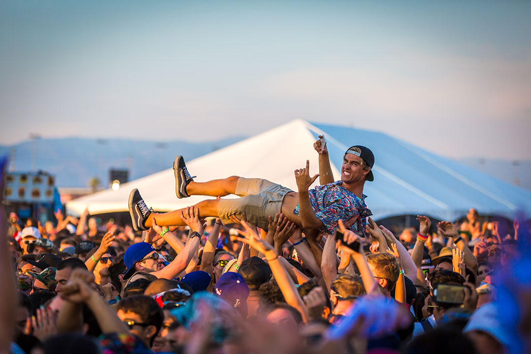 A fan crowd-surfing