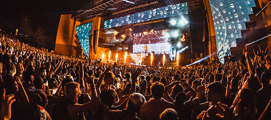 A packed crowd at the stage