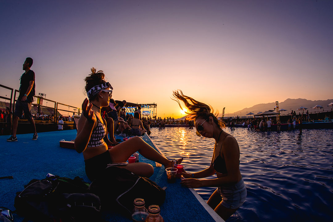 Friends hang at the VIP pool
