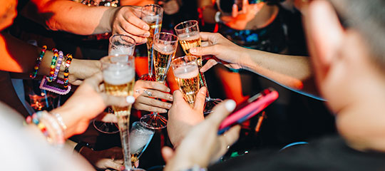 Headliners making a champagne toast